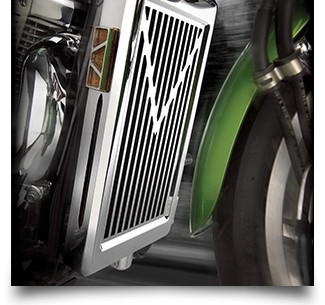 Chrome radiator grille cover on a green Honda Shadow